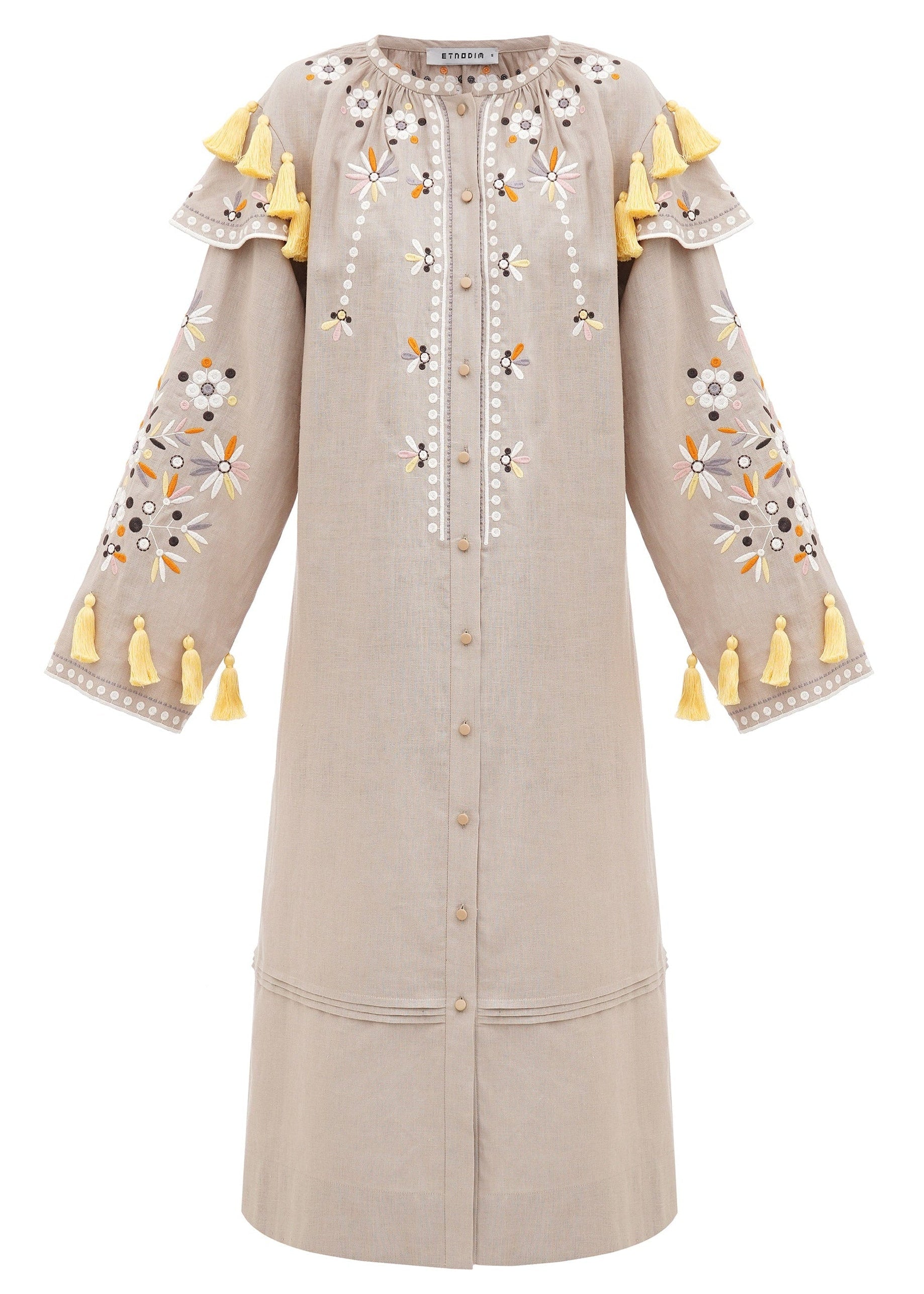 Rochia Vesnyanka bej brodată cu motive florale și ciucuri