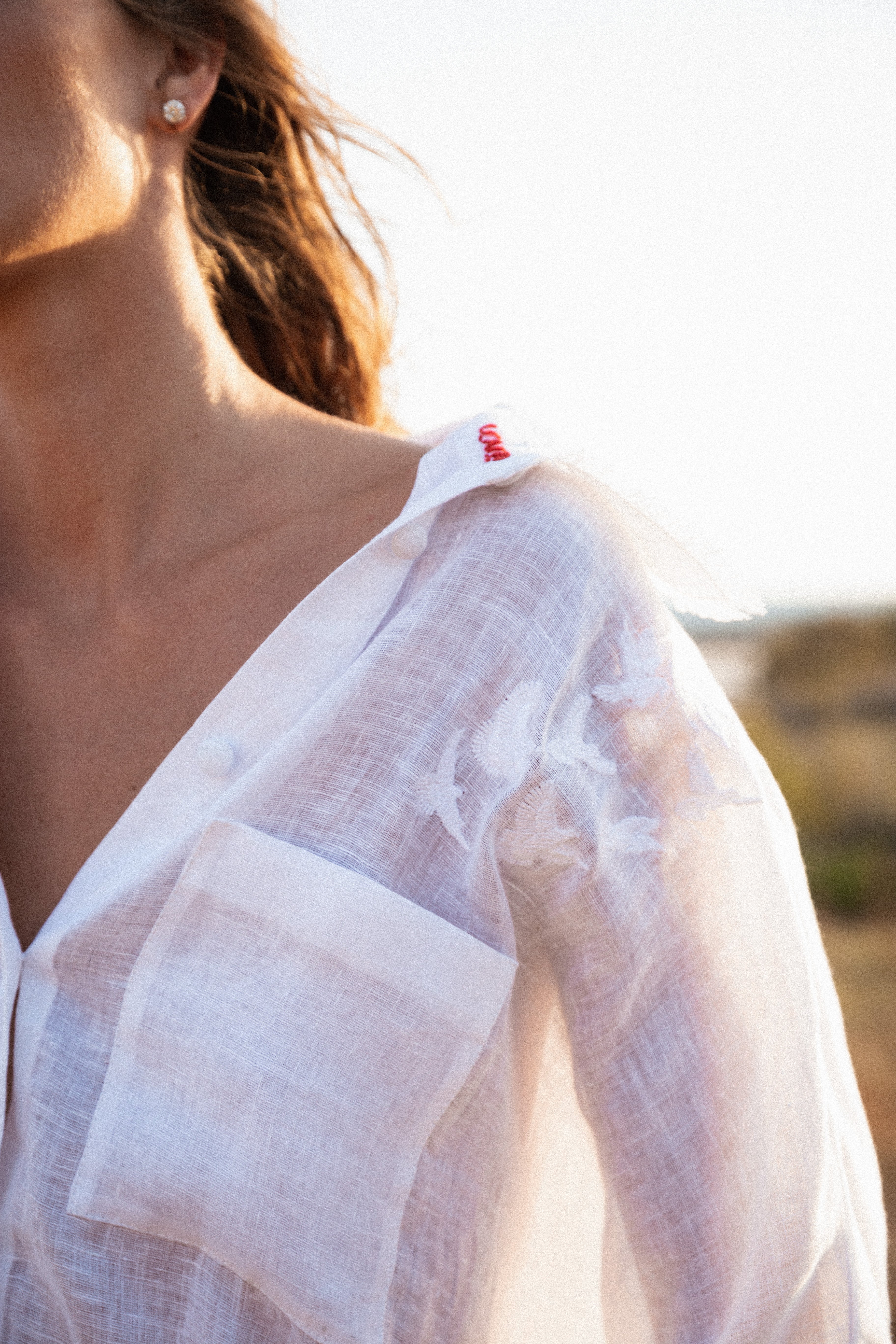 Bird embroidered white shirt