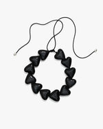 Load image into Gallery viewer, AURA necklace with black porcelain hearts
