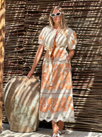 Load image into Gallery viewer, Embroidered midi linen ivory dress with orange ornaments Milo
