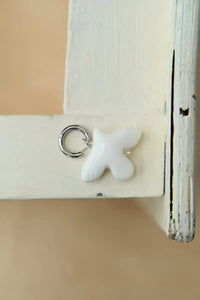 MYRNI single earring with a bird, silver hardware