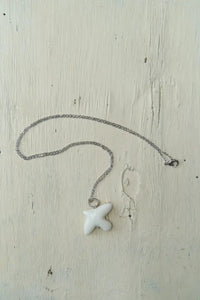 MYRNI pendant with a bird on a chain, silver hardware