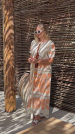 Load and play video in Gallery viewer, Embroidered midi linen ivory dress with orange ornaments Milo
